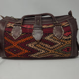 SMALL MOROCCAN LEATHER ONE OF A KIND KILIM DUFFLE BAG