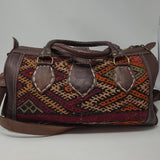 SMALL MOROCCAN LEATHER ONE OF A KIND KILIM DUFFLE BAG